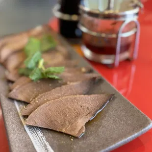 牛舌 Beef Tongue seasoned w/ special sauce ($14.95)