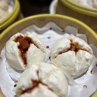 three dumplings in a bowl