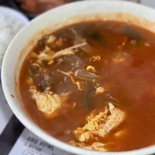 a bowl of soup and rice