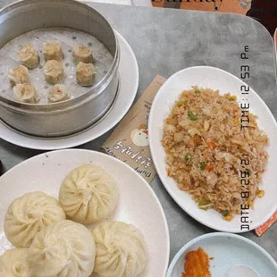 Shumai, chicken fried rice, pork buns and shrimp tempura.