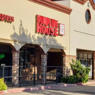 a dumpling house on a sunny day