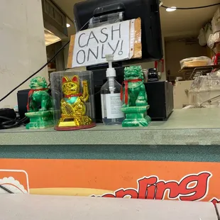 a cash only sign on a counter