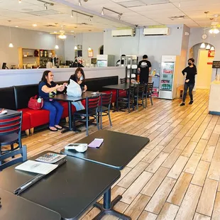 diners sitting at tables in a restaurant