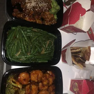 Sesame chicken, dry fried string beans, Gen Gau&apos;s Jumbo Shrimp, scallion pancakes.  Scallion Pancakes were burnt yet somehow still amazing.