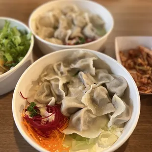 Beef &amp; onion potstickers, pork&amp; cabbage potstickers, and kim chi