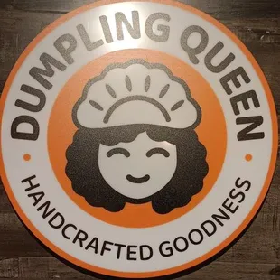 a sign for dumpling queen