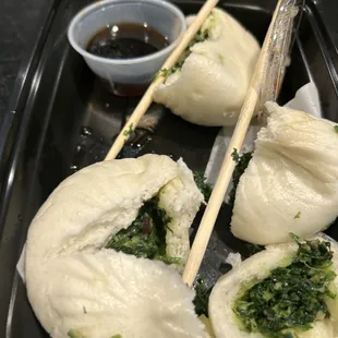 Frozen spinach leaking green on the bun