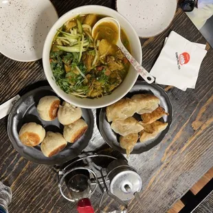 Top: Curry chicken noodle soup  Right: 11. Pork Pan Fried Bun  Left: 2. Pork Fried Dumpling