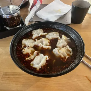 Pork & Scallion Spicy And Sour Dumplings