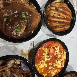 Tomato and egg- basically soul food for Chinese. Pork shoulder, pork belly over preserved veggies,eggplant