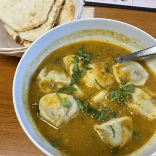 Jhol MOMO! Definitely get the Naan with this! It is all home made!