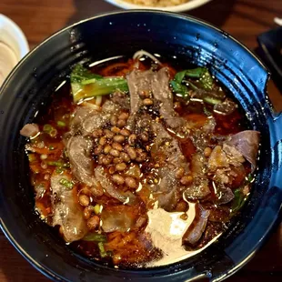 Spicy sour sweet potato noodles, beef was tasty and the flavor was pretty rich