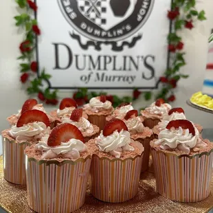 cupcakes with whipped cream and strawberries