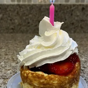 Cheesecake with strawberries and whipped cream- yummy!