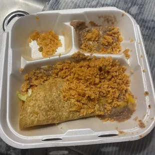 a meal in a styrofoam container