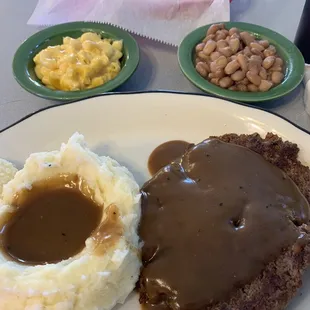 Hamburger steak, mac 'n' cheese, pintos and mashed potatoes