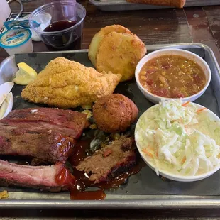 catfish and rib plate with cole slaw and brunswick stew .. and a couple fried green tomatos from my app that were amazing