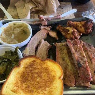 ribs and brisket add on- soft delicious brisket and the collards and cabbage are screaming'. so so yummy
