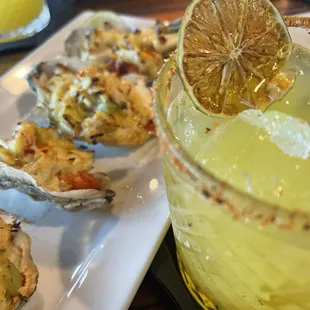 Roasted oysters with deviled crab and Mile Post 13 cocktail