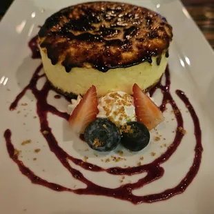 a dessert with strawberries and blueberries