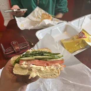 Hummus veggie on everything bagel