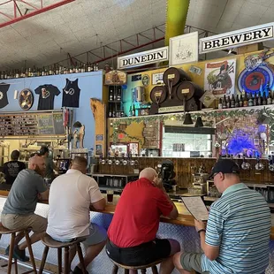 people sitting at the bar