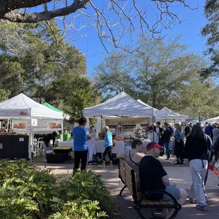 a crowd of people walking around