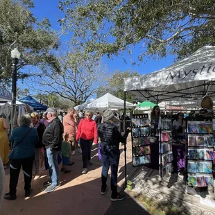 a crowd of people shopping