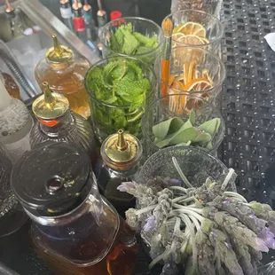 a variety of ingredients on a bar counter