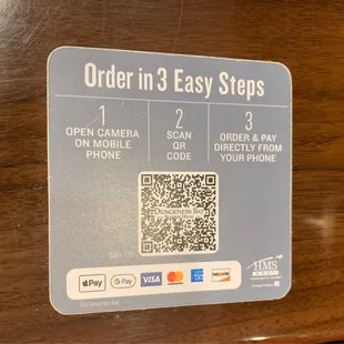 San QR code at table to order and pay.