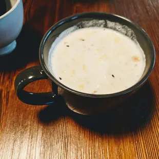a bowl of soup and a cup of coffee