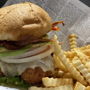 Hand breaded Fried Chicken sandwich w/Avocado, LTO, bacon, Pepperjack and a half order of fries.