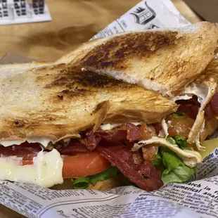 B.B.B.B.B.L.T w/Avocado, Egg, Cheddar cheese and Raw Onion.