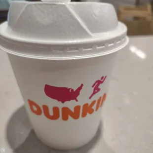 Small coffee with cream and sugar for $1.00 plus tax is $1.05