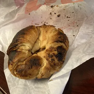 Burnt sausage and egg breakfast sandwich