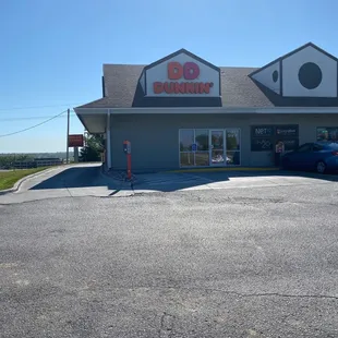 the outside of a dunkin donuts restaurant