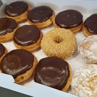 a dozen donuts in a box