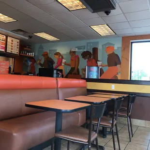  the interior of a dunkin donuts restaurant