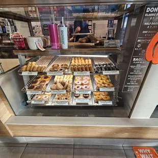  a display of donuts in a donut shop