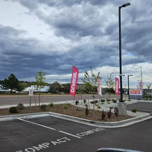  a parking lot with a lot of signs