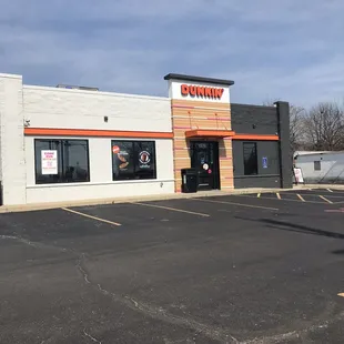  the outside of a dunkinkin donuts store