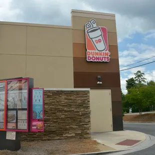  the outside of a dunkin donuts store