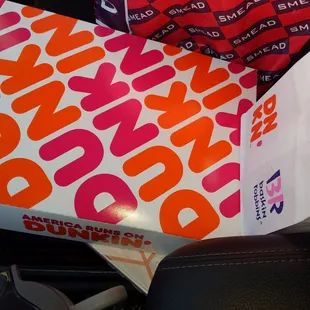  a box of donuts and a bag of donuts