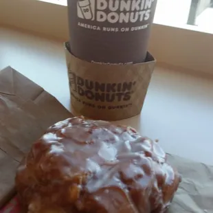  a donut and a cup of coffee