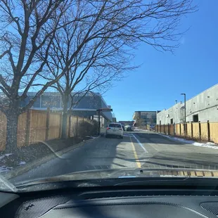  a car driving down a street