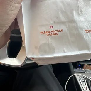 Bacon grease! Went through the bag it was put on and the outer bag. Nasty!