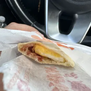 Uncooked bacon! The manager was too lazy to take the bacon out. Saturated with bacon grease! Just nasty. Total laziness!