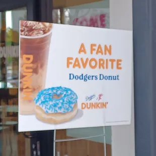  a fan favorite sign in front of a dunkin donut shop