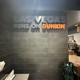 a person entering a building through a gate