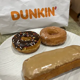 Maple, glazed, and chocolate sprinkle donut